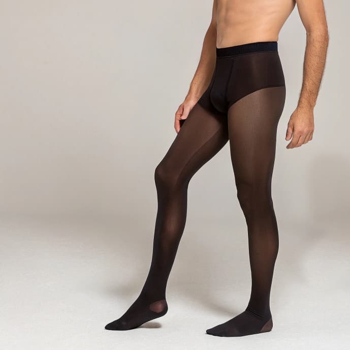 Mann in schwarzer, transparenter Glamory Herrenstrumpfhose, Seitenansicht